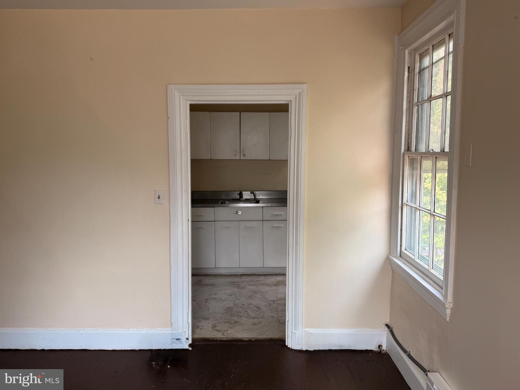 105 West Broadway, Unit C Salem, NJ 08079 - Photo 10 of 26 a room with a closet and windows