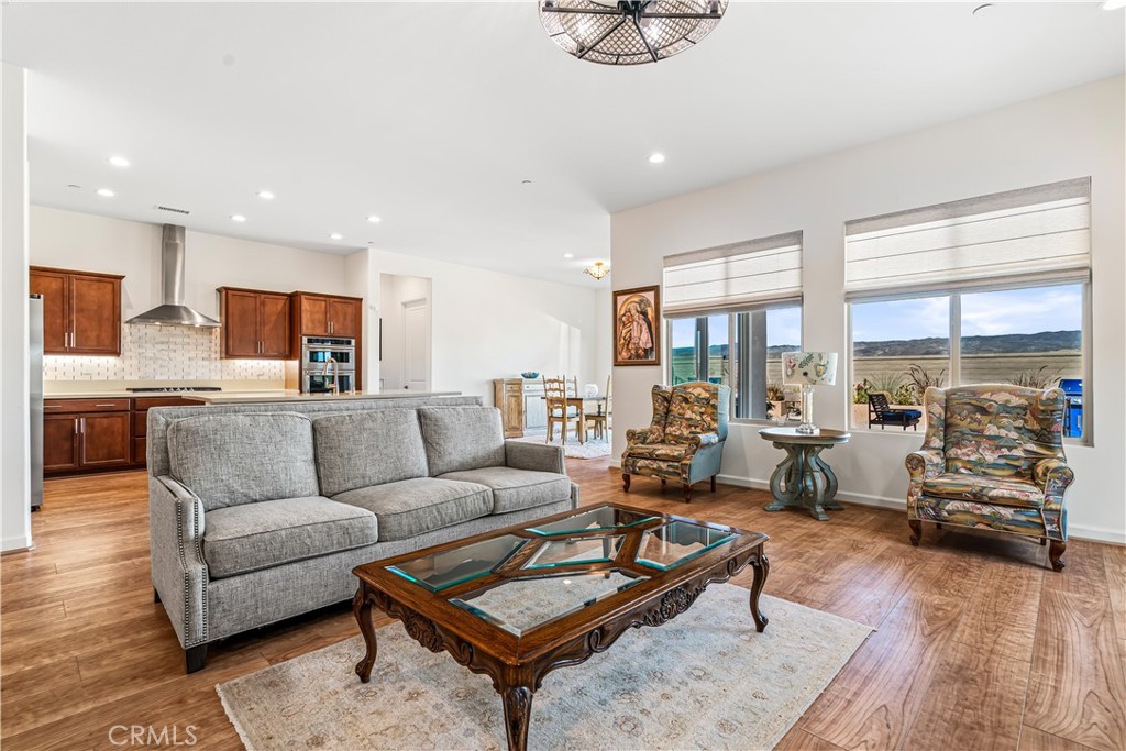 82 Prosecco Rancho Mirage, CA 92270 - Photo 15 of 56 a living room with furniture and a large window