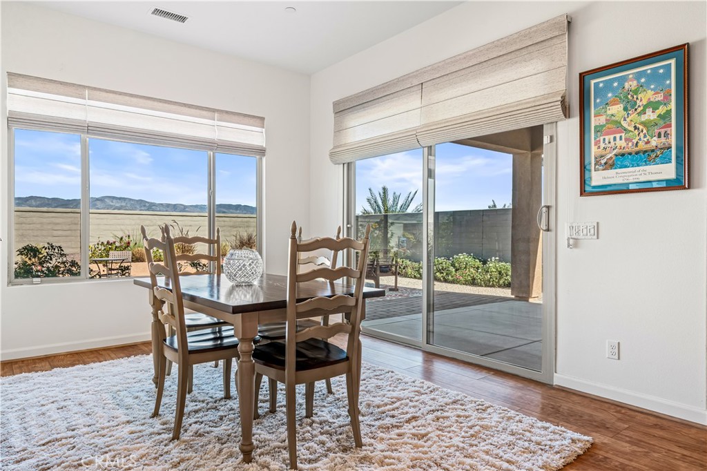 82 Prosecco Rancho Mirage, CA 92270 - Photo 16 of 56 a dining room with furniture and window