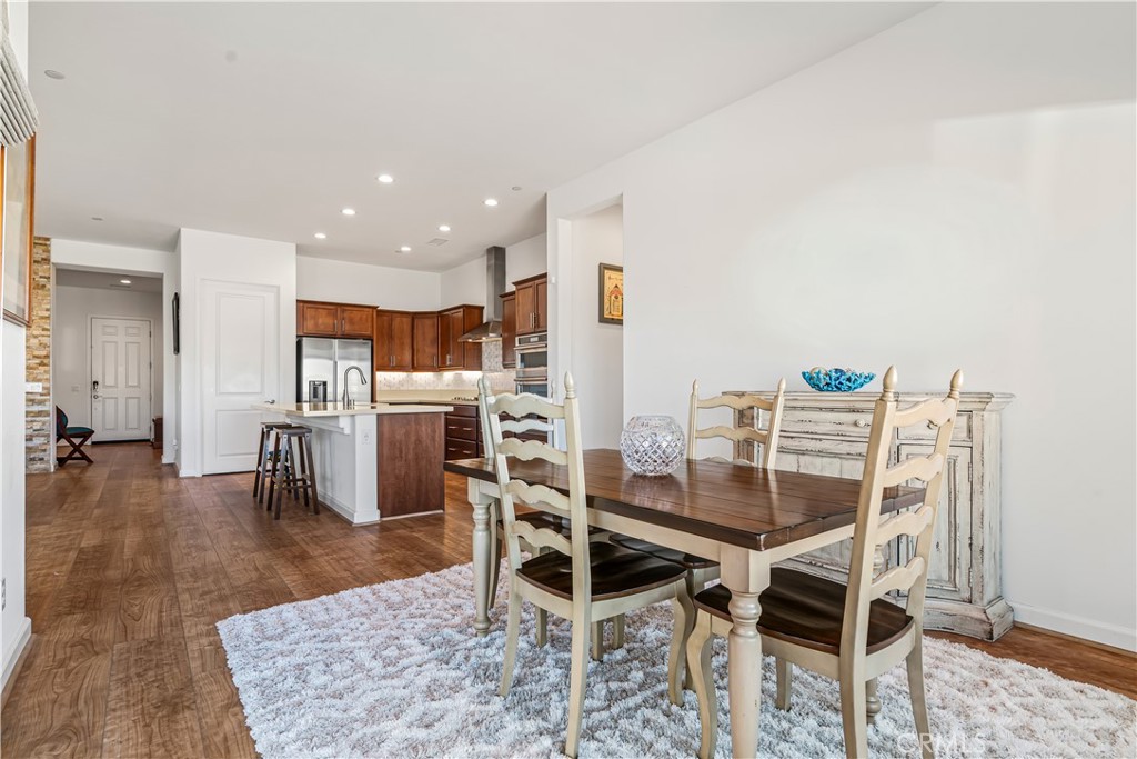 82 Prosecco Rancho Mirage, CA 92270 - Photo 17 of 56 a dining room with furniture and a table