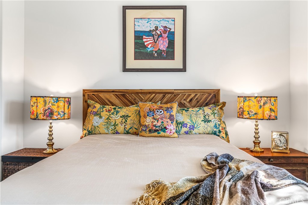 82 Prosecco Rancho Mirage, CA 92270 - Photo 26 of 56 a view of a bedroom with two bed