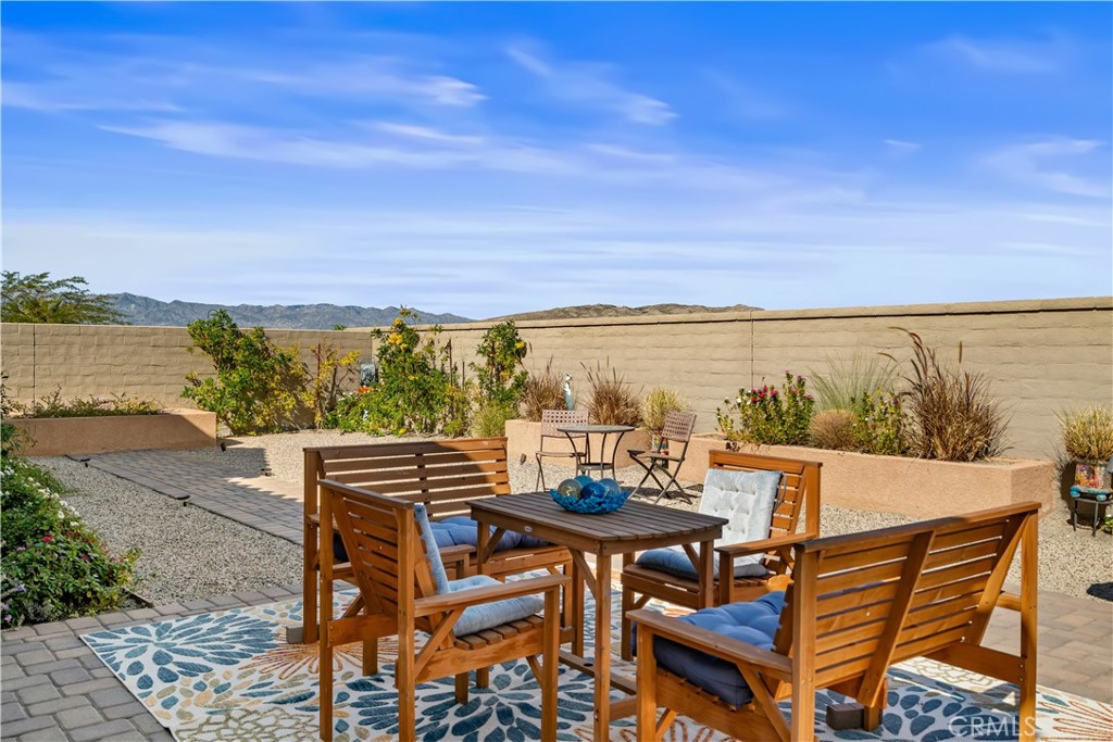 82 Prosecco Rancho Mirage, CA 92270 - Photo 31 of 56 a view of an outdoor seating area and furniture