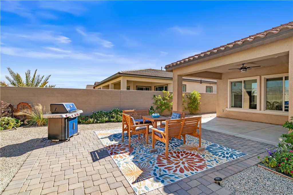 82 Prosecco Rancho Mirage, CA 92270 - Photo 35 of 56 a patio with table and chairs