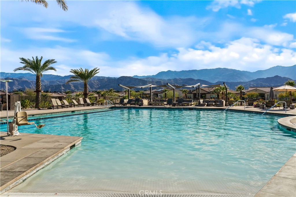 82 Prosecco Rancho Mirage, CA 92270 - Photo 45 of 56 a view of a lake with houses