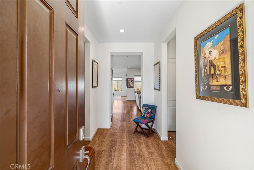82 Prosecco Rancho Mirage, CA 92270 - Photo 5 of 56 a view of a bedroom with bed and wooden floor