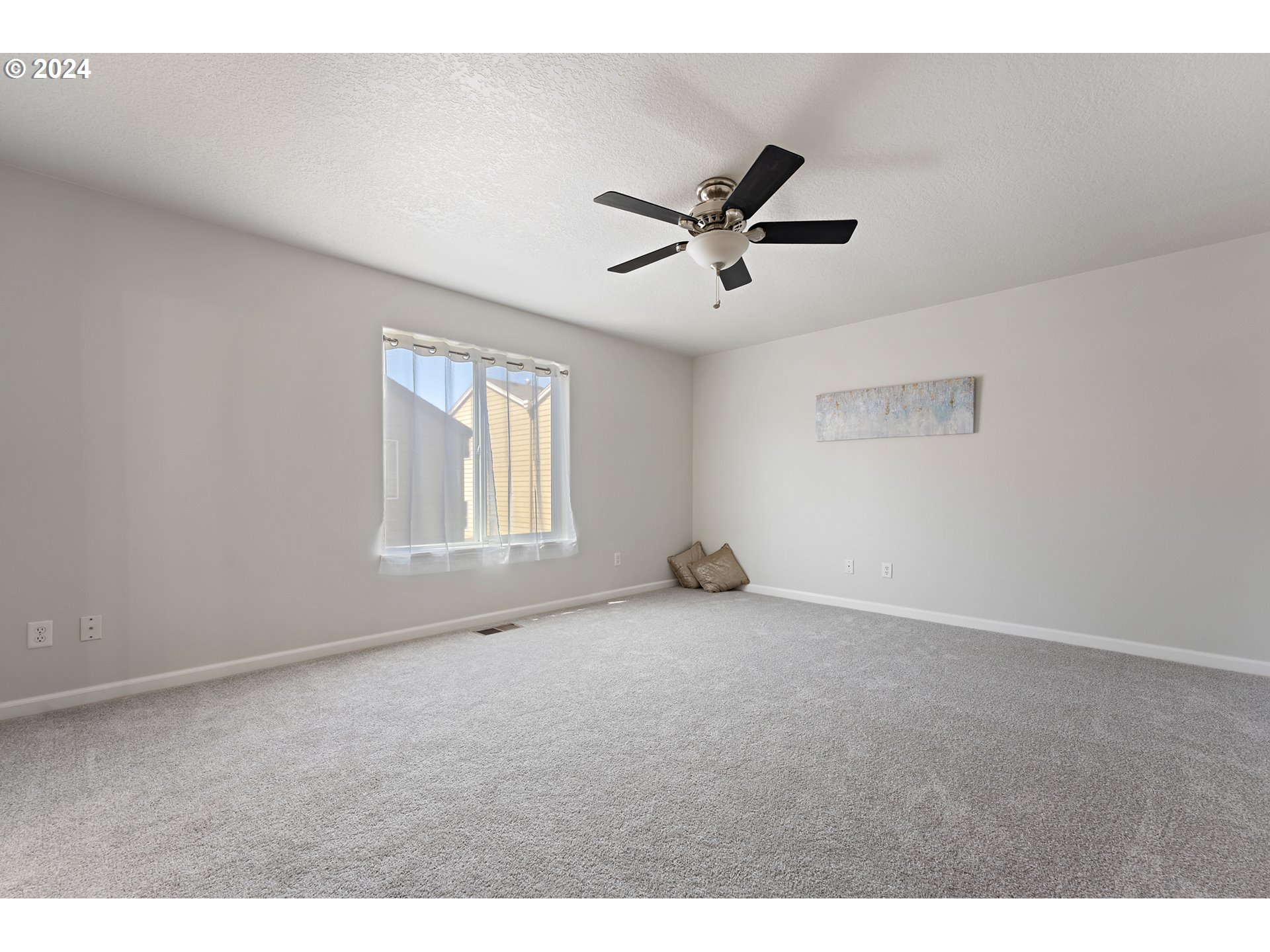 3149 Southwest 173rd Avenue Beaverton, OR 97003 - Photo 16 of 35 a view of an empty room with a window