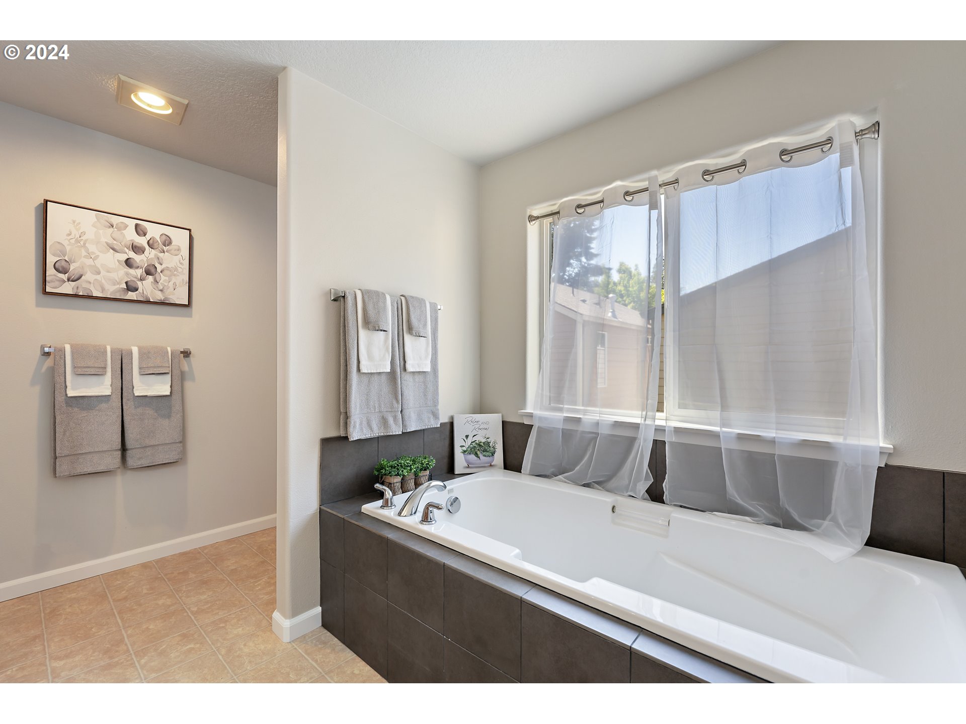 3149 Southwest 173rd Avenue Beaverton, OR 97003 - Photo 19 of 35 a living room with furniture and a large window