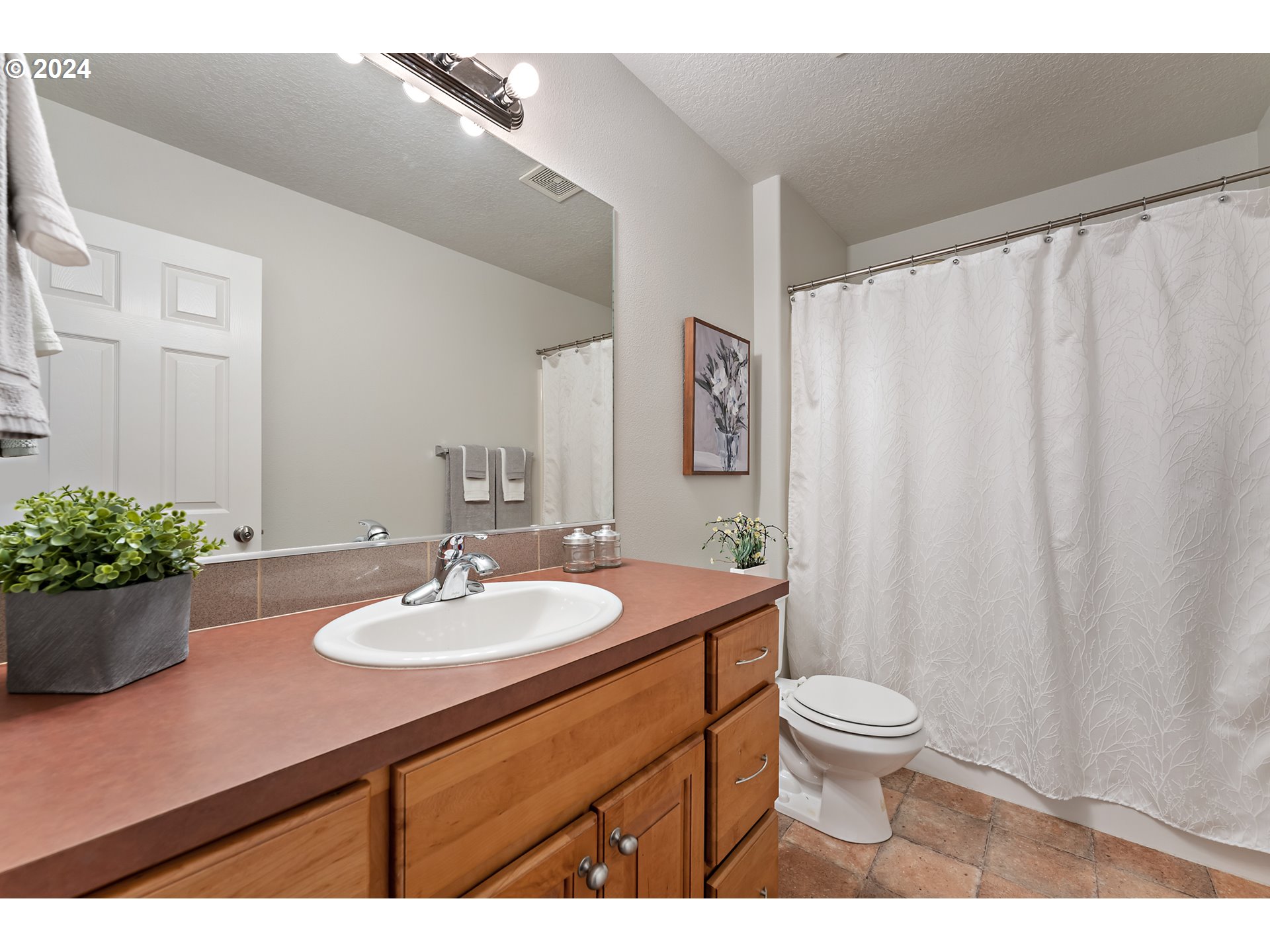 3149 Southwest 173rd Avenue Beaverton, OR 97003 - Photo 23 of 35 a bathroom with a sink toilet and shower