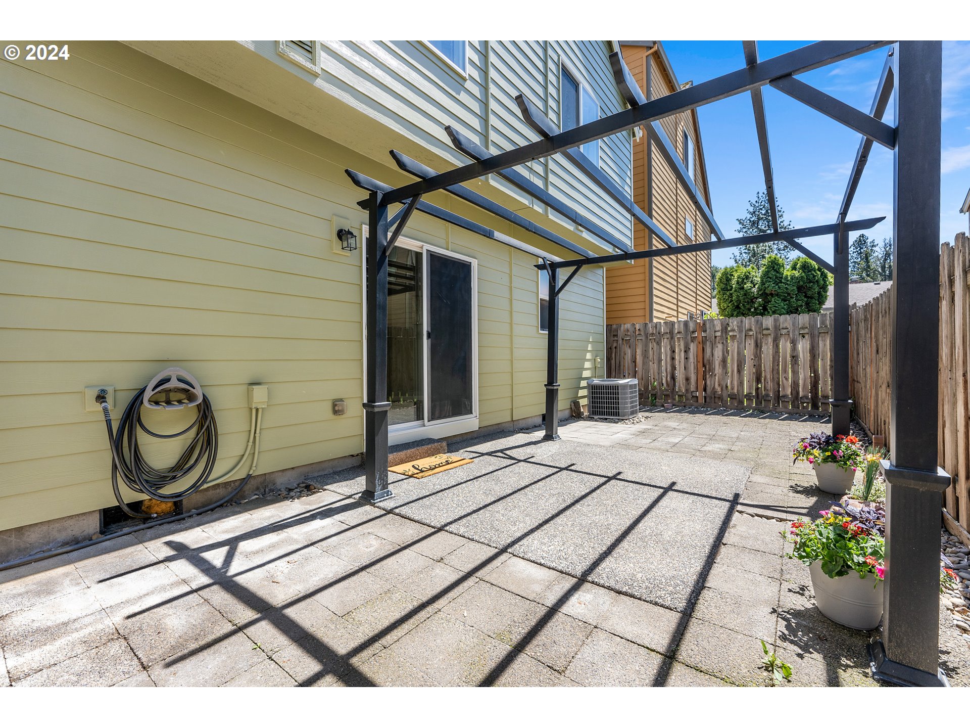 3149 Southwest 173rd Avenue Beaverton, OR 97003 - Photo 32 of 35 a view of a porch with a table and chairs