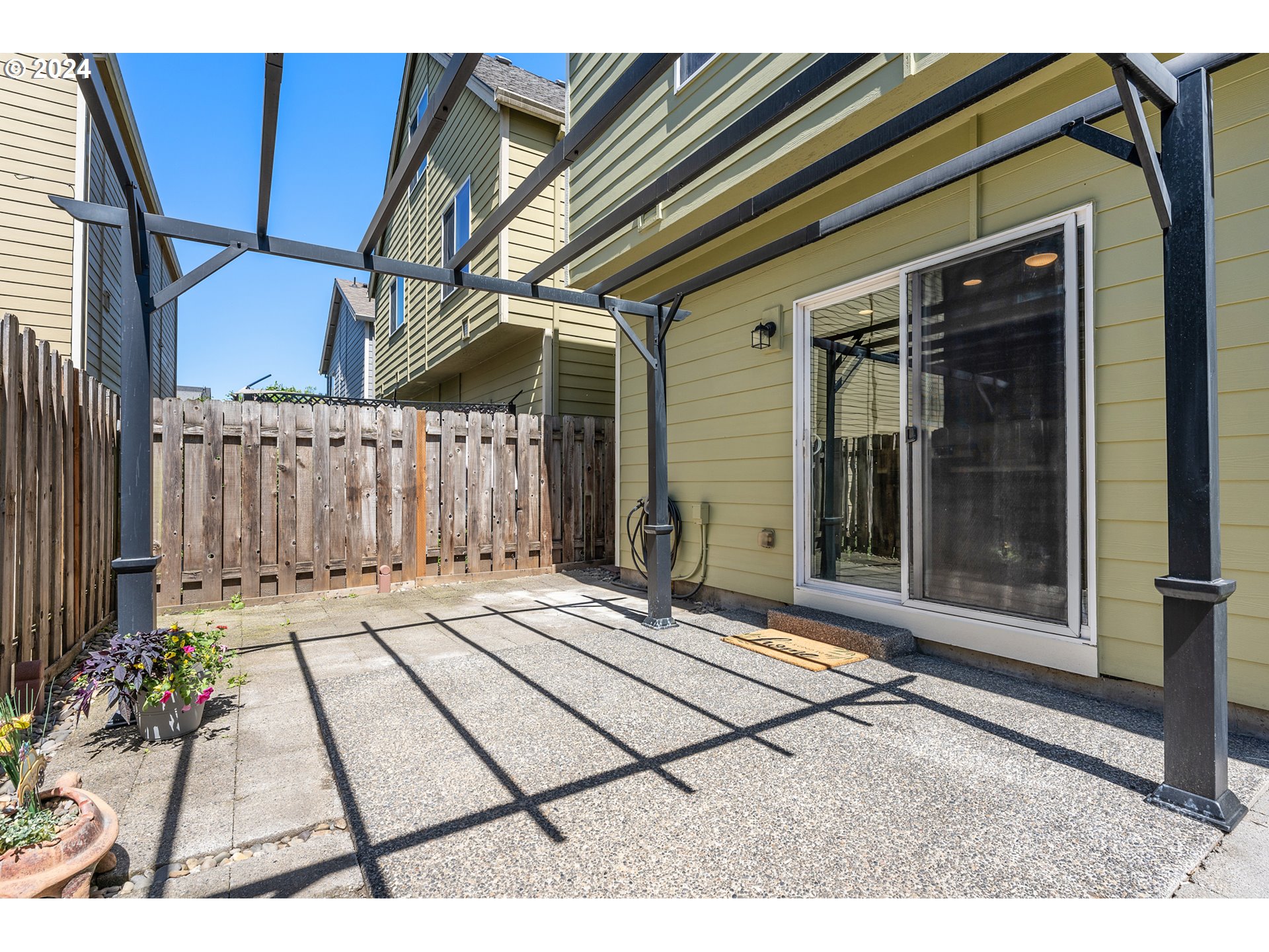 3149 Southwest 173rd Avenue Beaverton, OR 97003 - Photo 34 of 35 a view of a backyard with door and porch