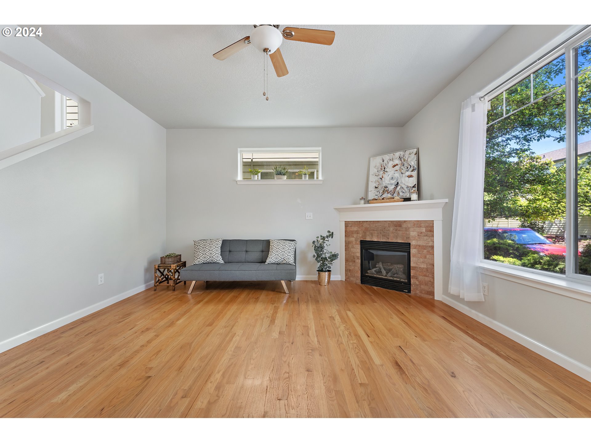 3149 Southwest 173rd Avenue Beaverton, OR 97003 - Photo 4 of 35 a view of empty room with fireplace and window