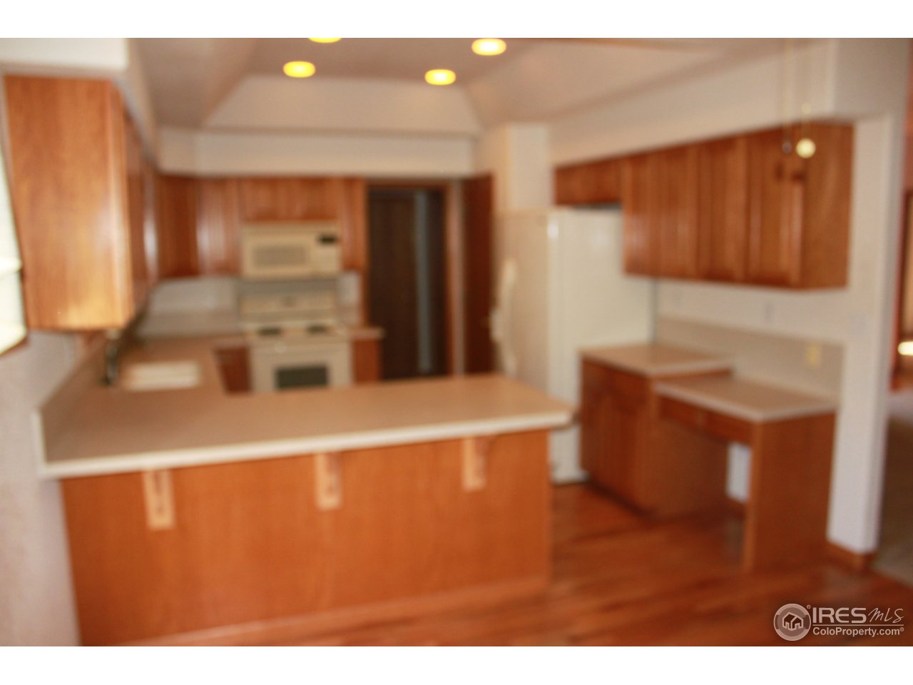 245 Sequoia Circle Windsor, CO 80550 - Photo 3 of 15 a kitchen with a sink