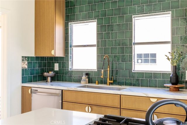 a bathroom with a sink and a window