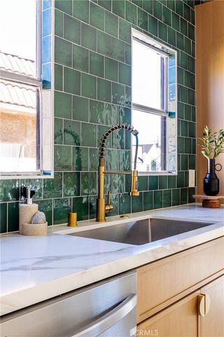 a bathroom with a sink and mirror