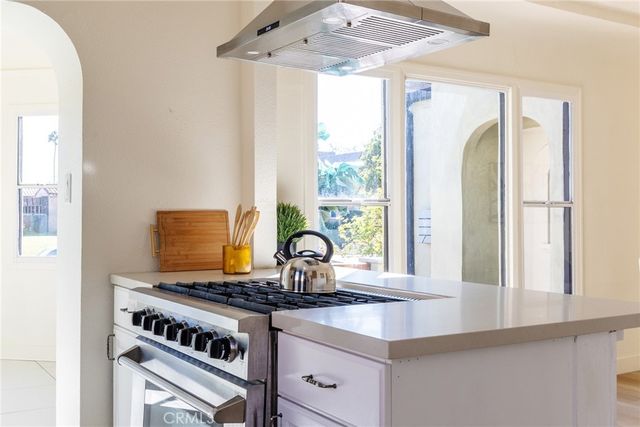 a view of a living room with a fireplace