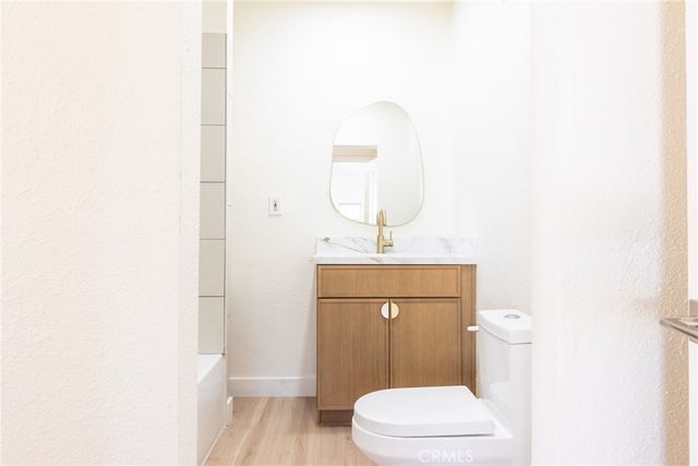 a bedroom with a bed and a cabinets