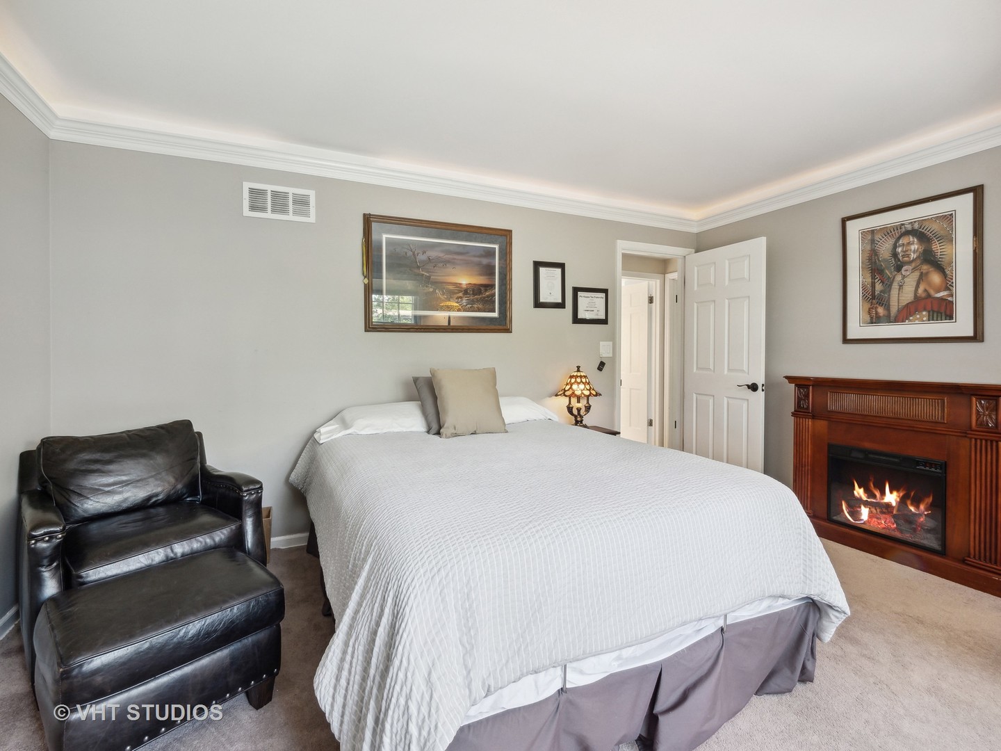 940 Shermer Road Northbrook, IL 60062 - Photo 12 of 41 a bedroom with a bed and a couch