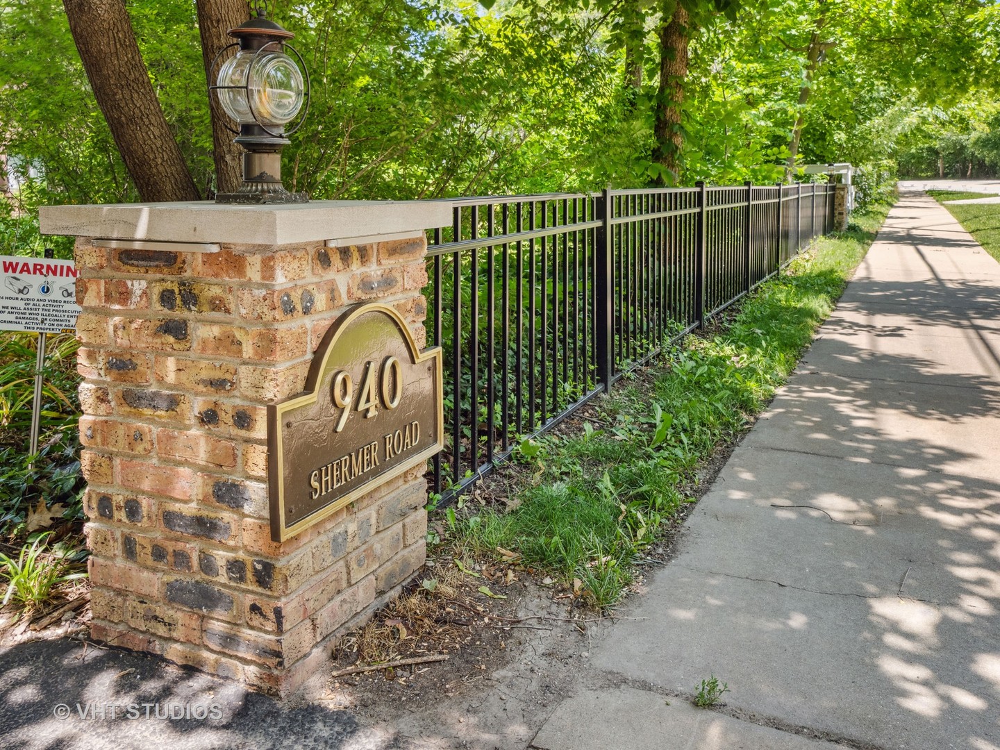 940 Shermer Road Northbrook, IL 60062 - Photo 21 of 41 a view of a pathway with a wrought iron stairs