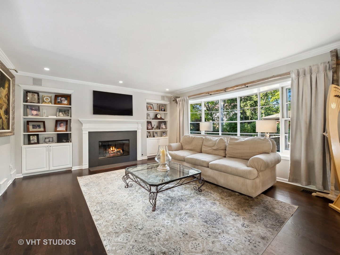 940 Shermer Road Northbrook, IL 60062 - Photo 28 of 41 a living room with furniture and a fireplace