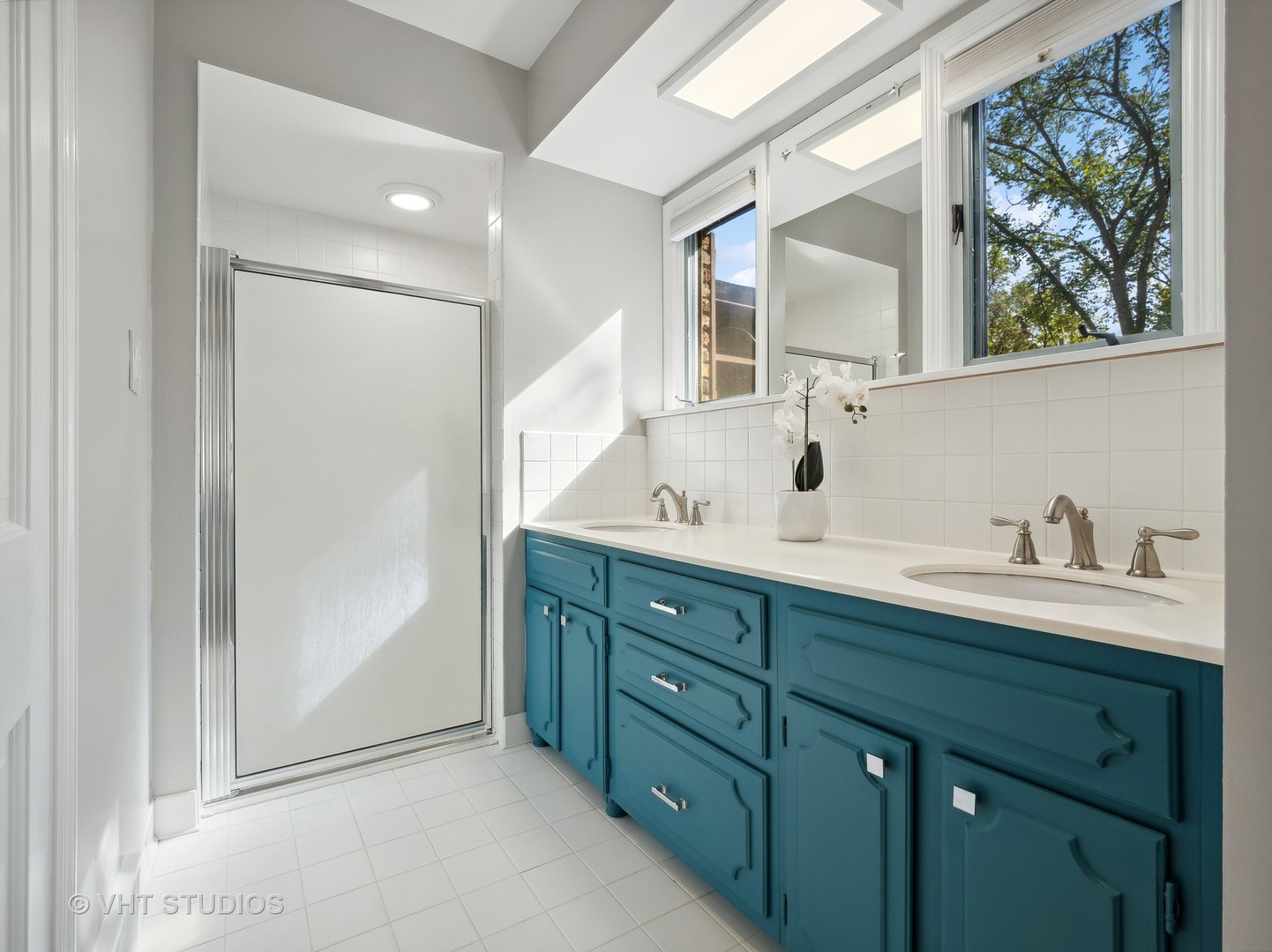 940 Shermer Road Northbrook, IL 60062 - Photo 31 of 41 a bathroom with a double vanity sink mirror and