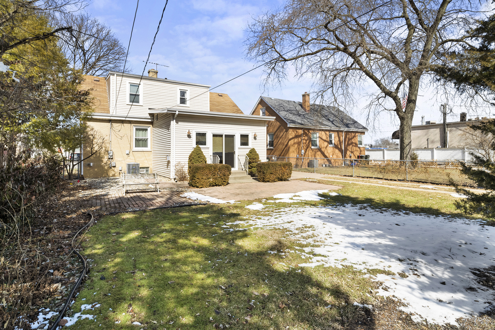 349 East Quincy Street Riverside, IL 60546 - Photo 25 of 26 a front view of a house with a yard