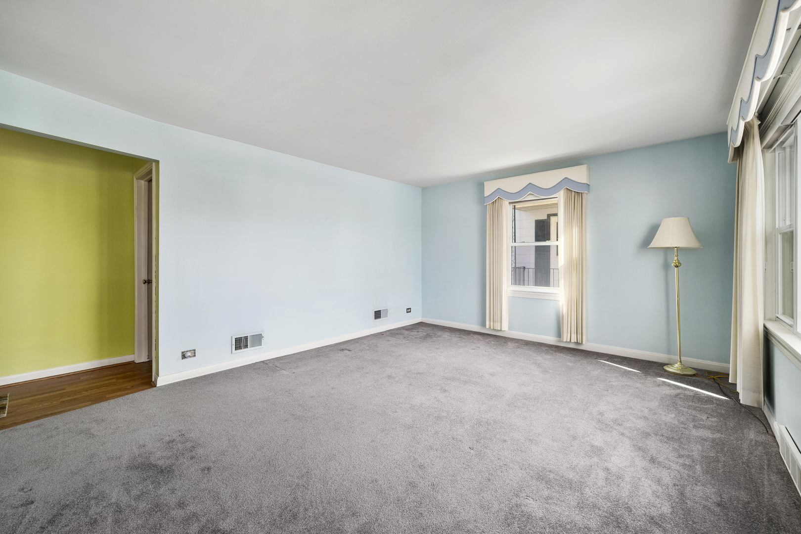 349 East Quincy Street Riverside, IL 60546 - Photo 5 of 26 an empty room with windows