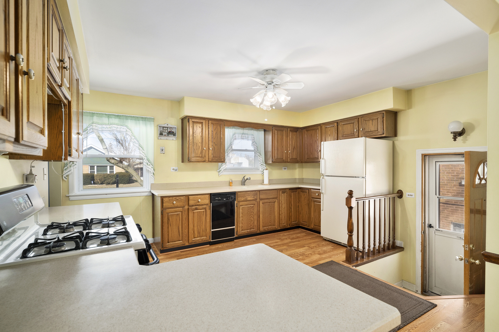 349 East Quincy Street Riverside, IL 60546 - Photo 7 of 26 a kitchen with stainless steel appliances a stove a sink and a refrigerator