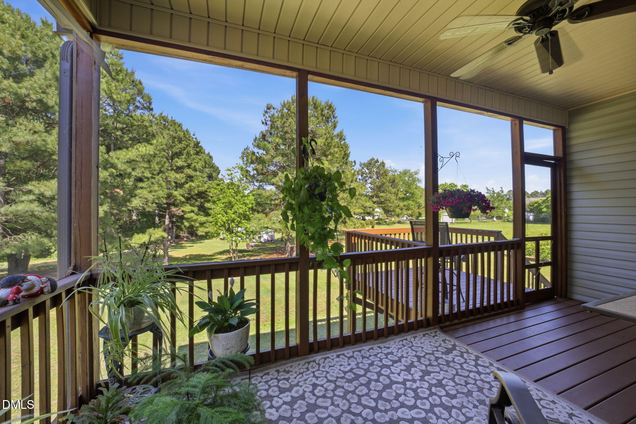 1547 Lassiter Pond Road Four Oaks, NC 27524 - Photo 31 of 45 a view of a porch with wooden floor