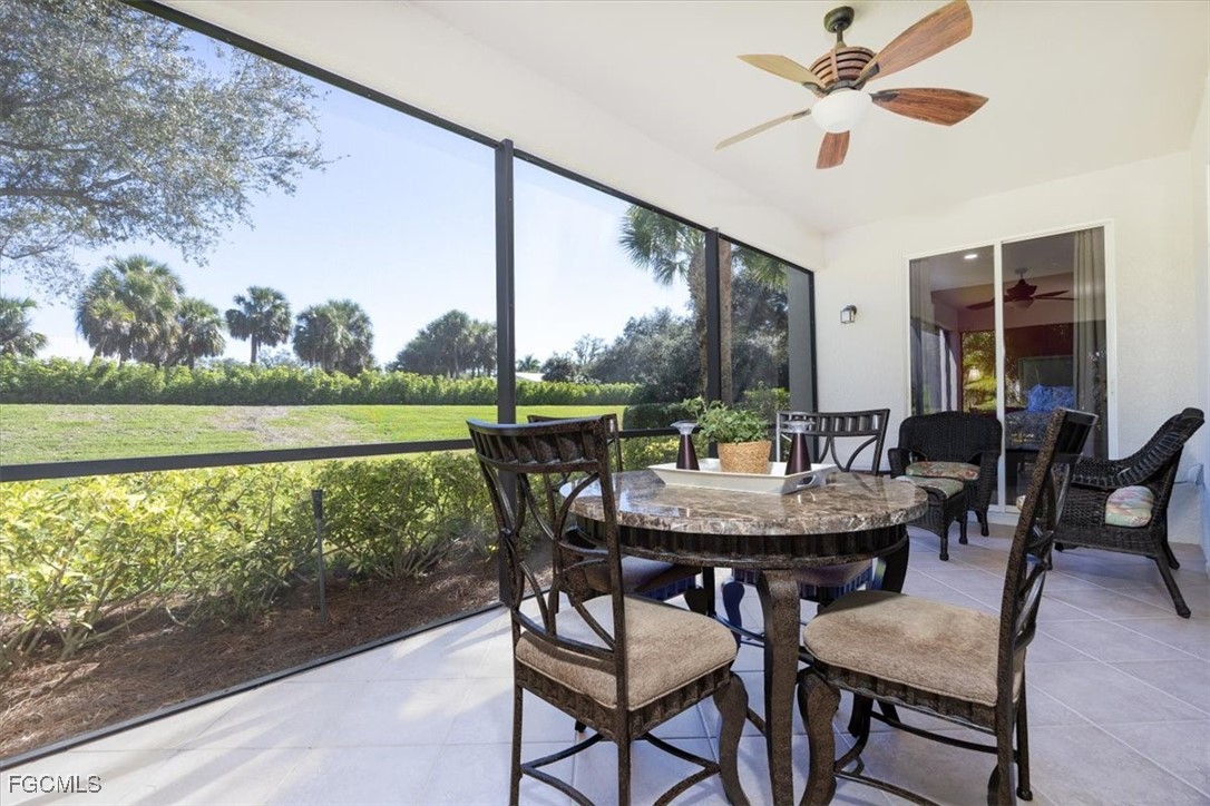 13091 Pebblebrook Ridge Court, Unit 101 Fort Myers, FL 33905 - Photo 13 of 39 a view of a dining room with furniture window and outside view