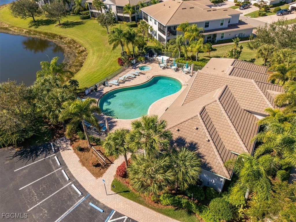 13091 Pebblebrook Ridge Court, Unit 101 Fort Myers, FL 33905 - Photo 35 of 39 a view of a swimming pool with a yard