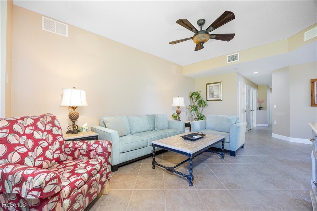 13091 Pebblebrook Ridge Court, Unit 101 Fort Myers, FL 33905 - Photo 6 of 39 a living room with furniture