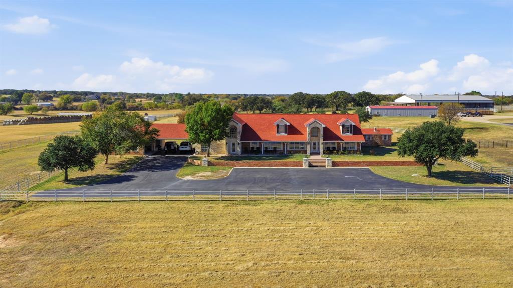a view of a swimming pool and an outdoor seating