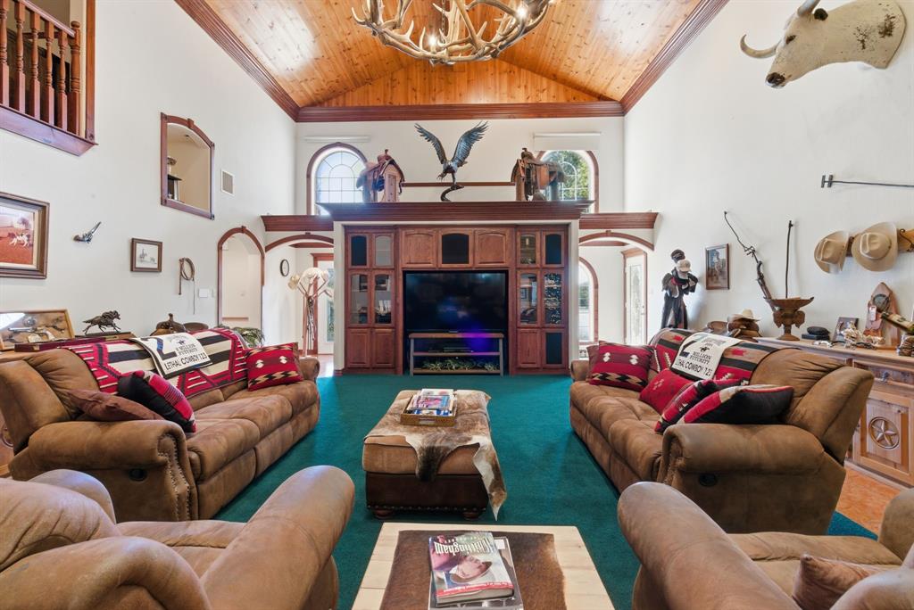 2691 North Fm Road 51 Springtown, TX 76082 - Photo 11 of 40 a living room with furniture and a fireplace