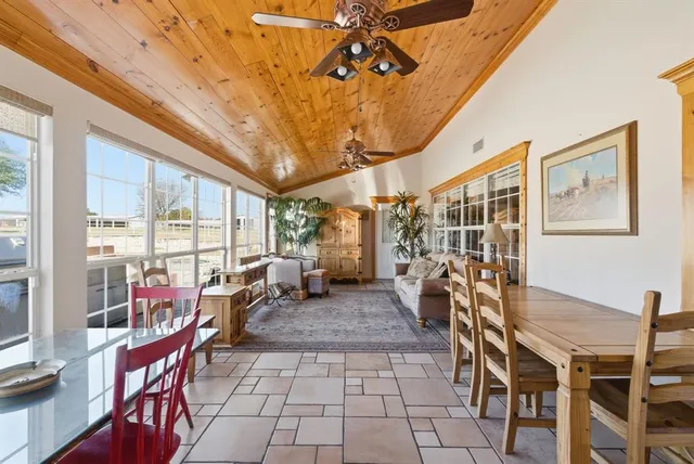 a living room with furniture a chandelier