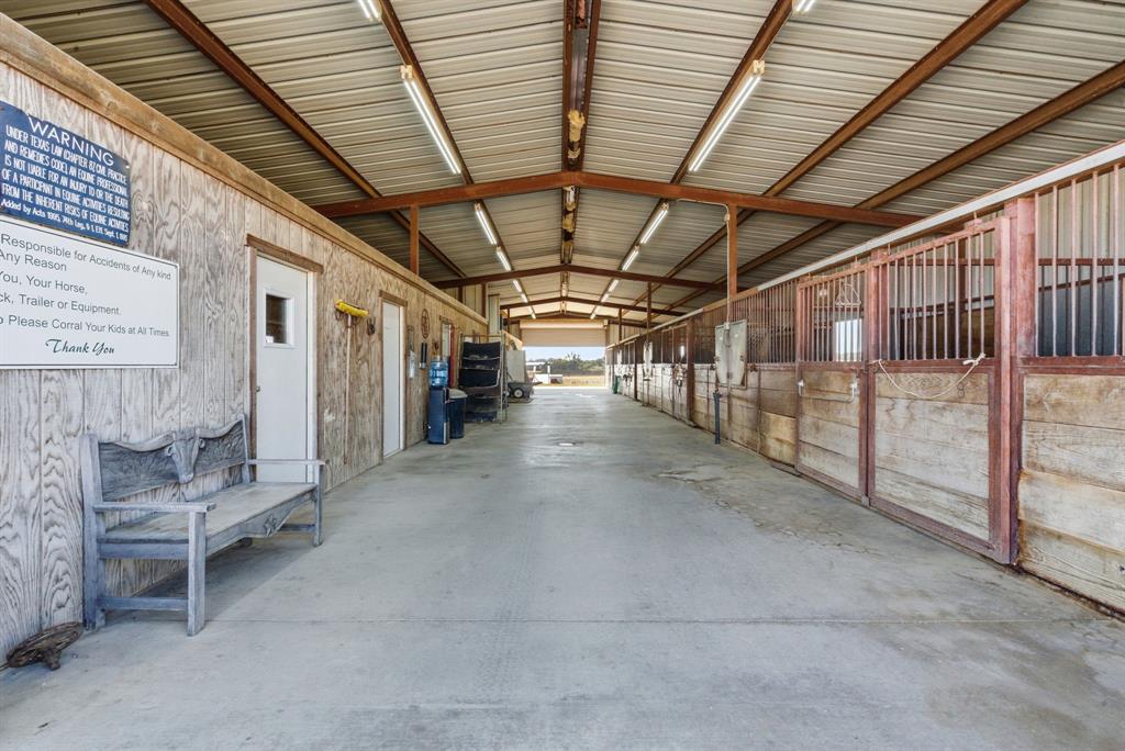 2691 North Fm Road 51 Springtown, TX 76082 - Photo 29 of 40 a view of an empty room with wooden ceiling