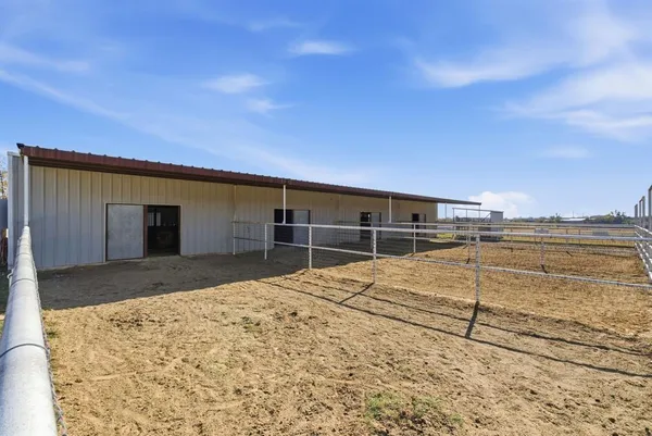 a view of swimming pool with outdoor seating