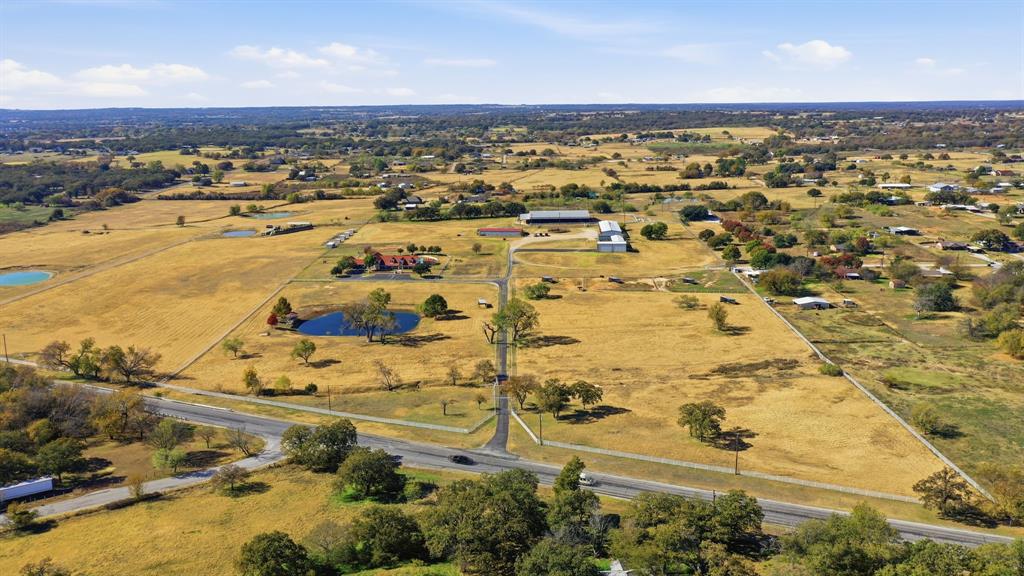 2691 North Fm Road 51 Springtown, TX 76082 - Photo 8 of 40 an aerial view of residential building with parking space