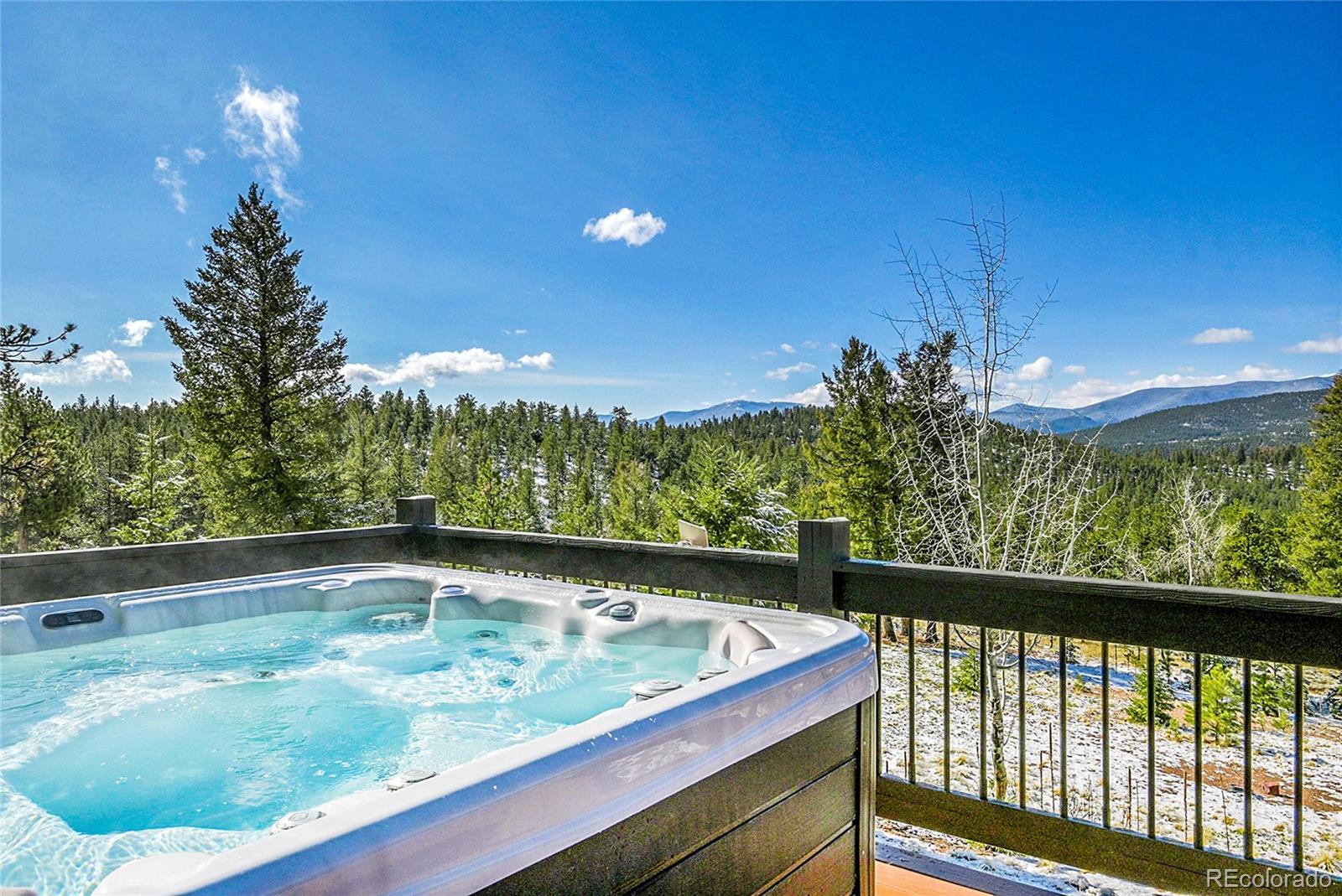 1567 Tapadero Road Bailey, CO 80421 - Photo 11 of 26 a view of swimming pool from a balcony