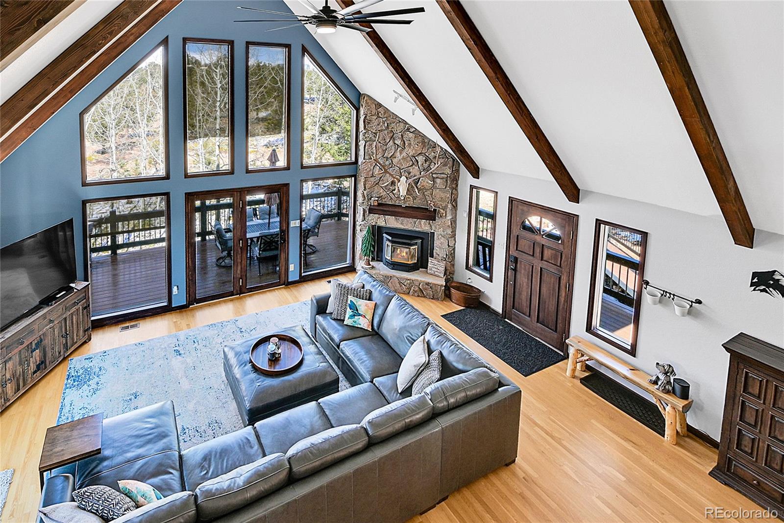 1567 Tapadero Road Bailey, CO 80421 - Photo 13 of 26 a view of living room with furniture and flat screen tv