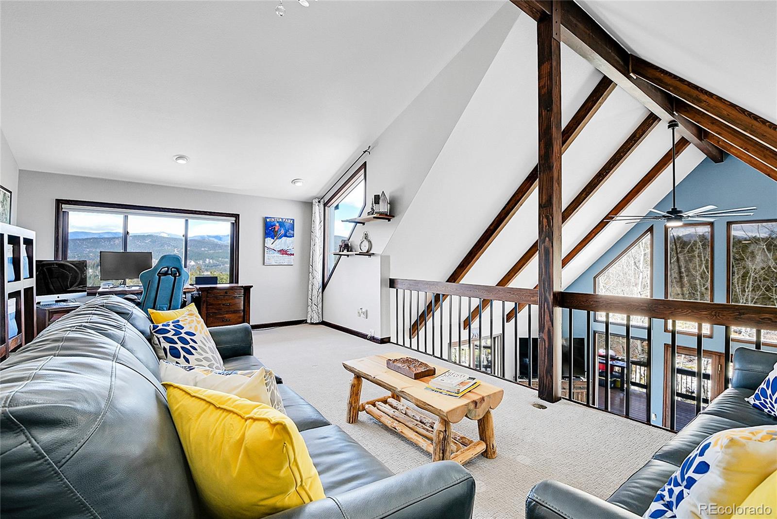 1567 Tapadero Road Bailey, CO 80421 - Photo 16 of 26 a outdoor living room with furniture and a table