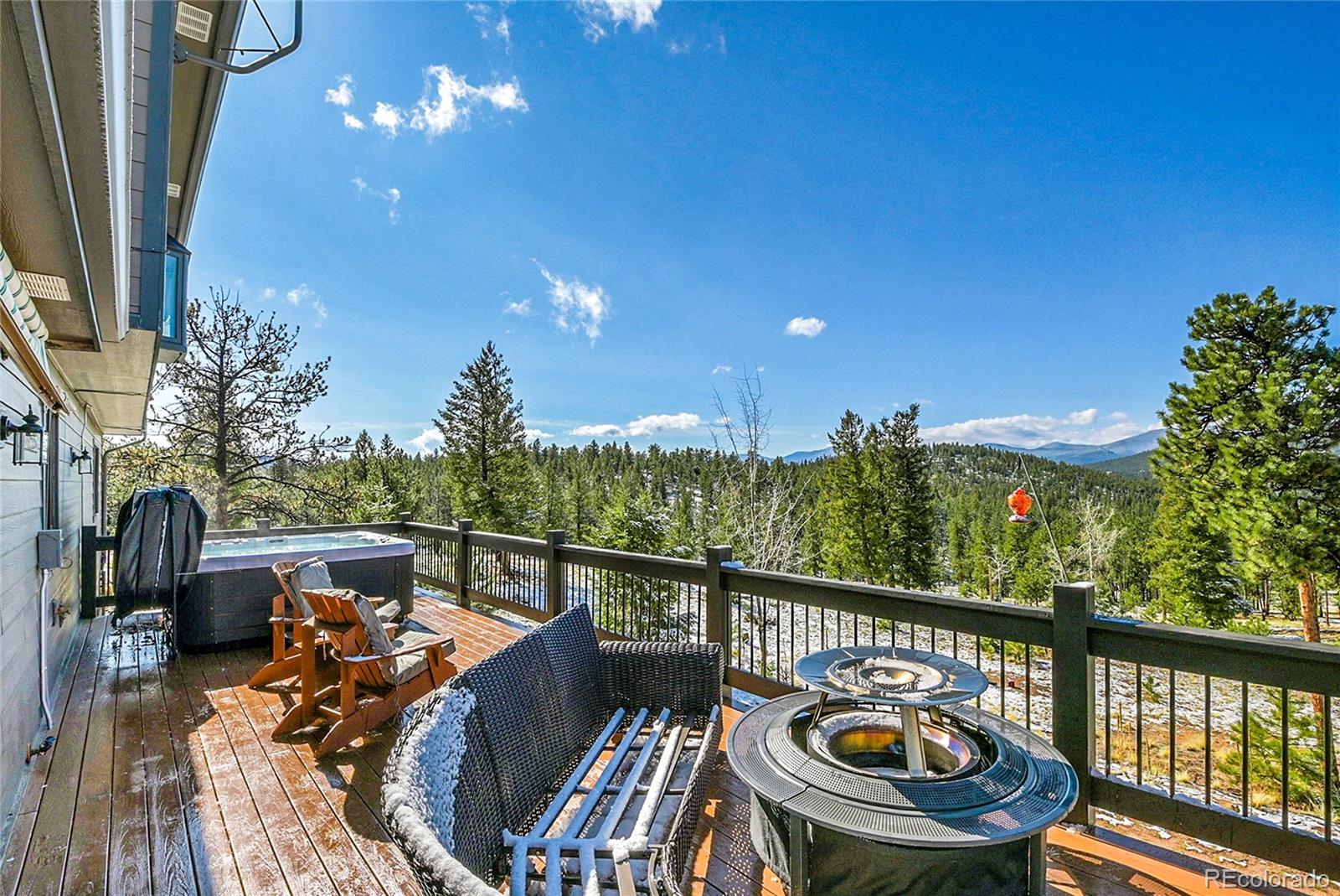 1567 Tapadero Road Bailey, CO 80421 - Photo 20 of 26 a view of a balcony with furniture