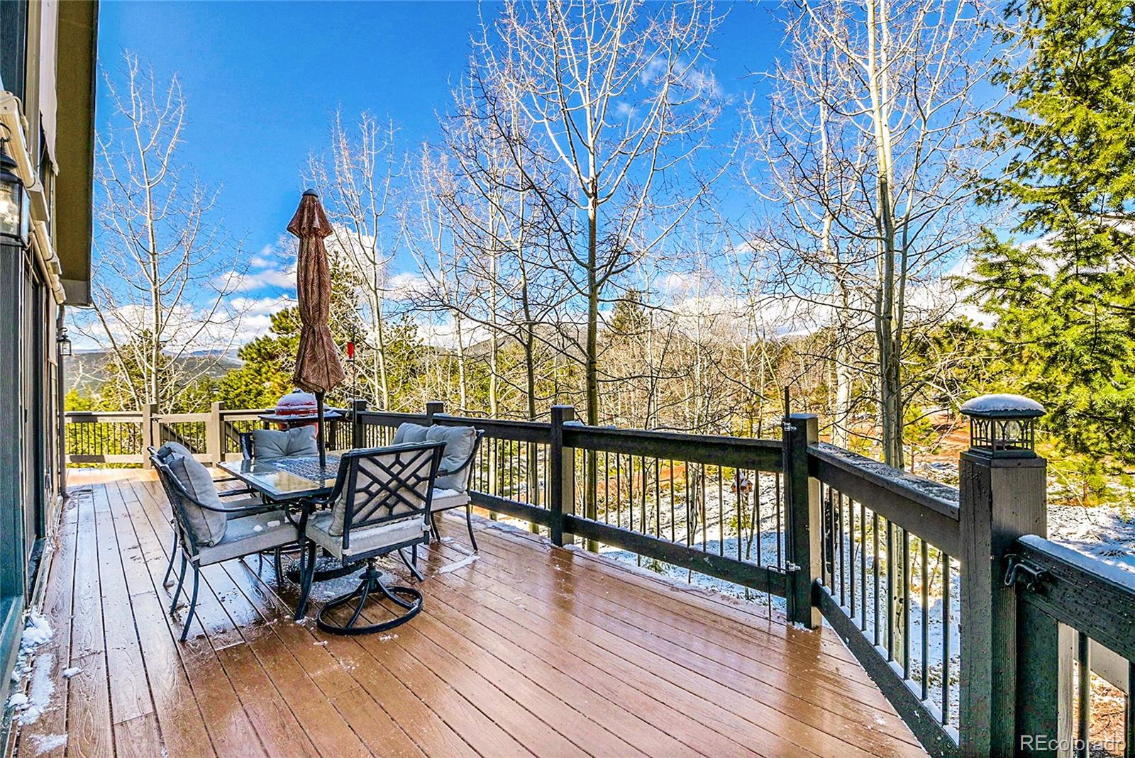 1567 Tapadero Road Bailey, CO 80421 - Photo 24 of 26 a view of a chairs and table on the wooden floor
