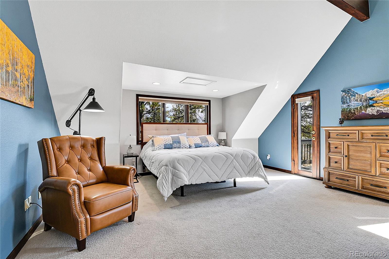 1567 Tapadero Road Bailey, CO 80421 - Photo 7 of 26 a bedroom with furniture and a window