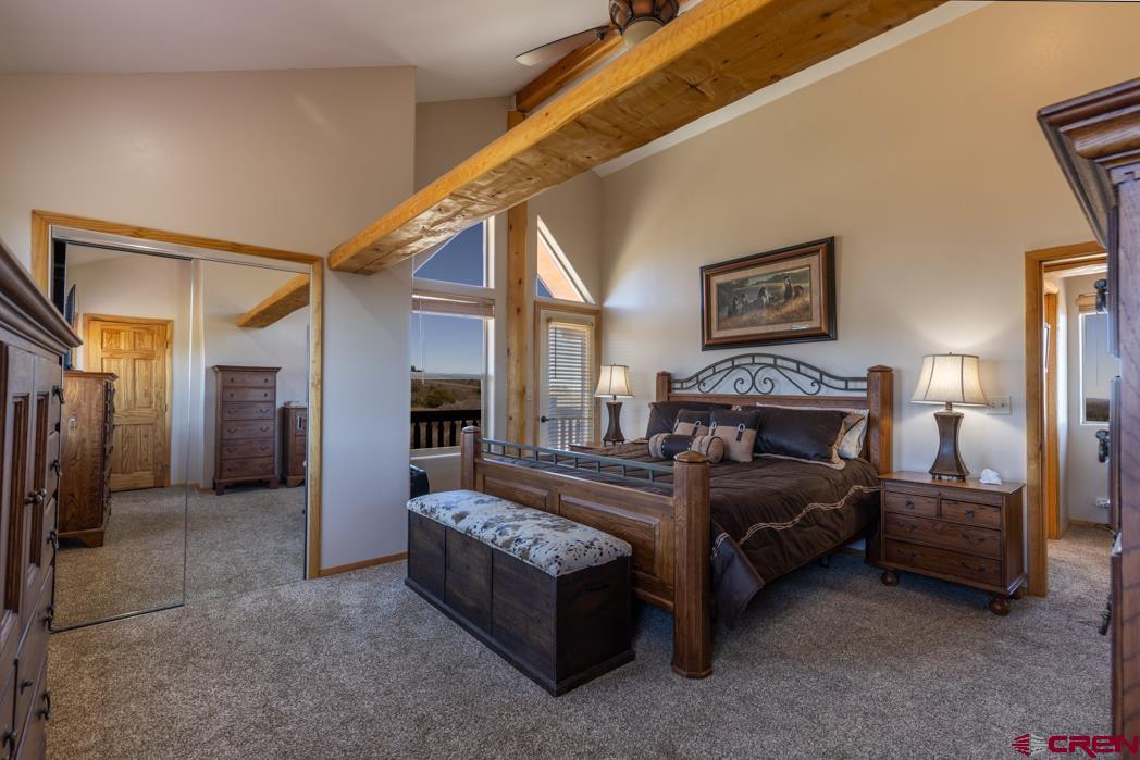 1737 Roberts Ridge Drive Hesperus, CO 81326 - Photo 14 of 34 a living room with furniture and a fireplace