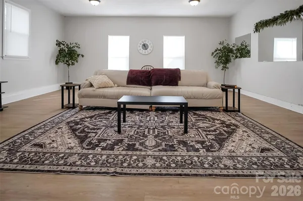 a living room with a couch coffee table and a couch