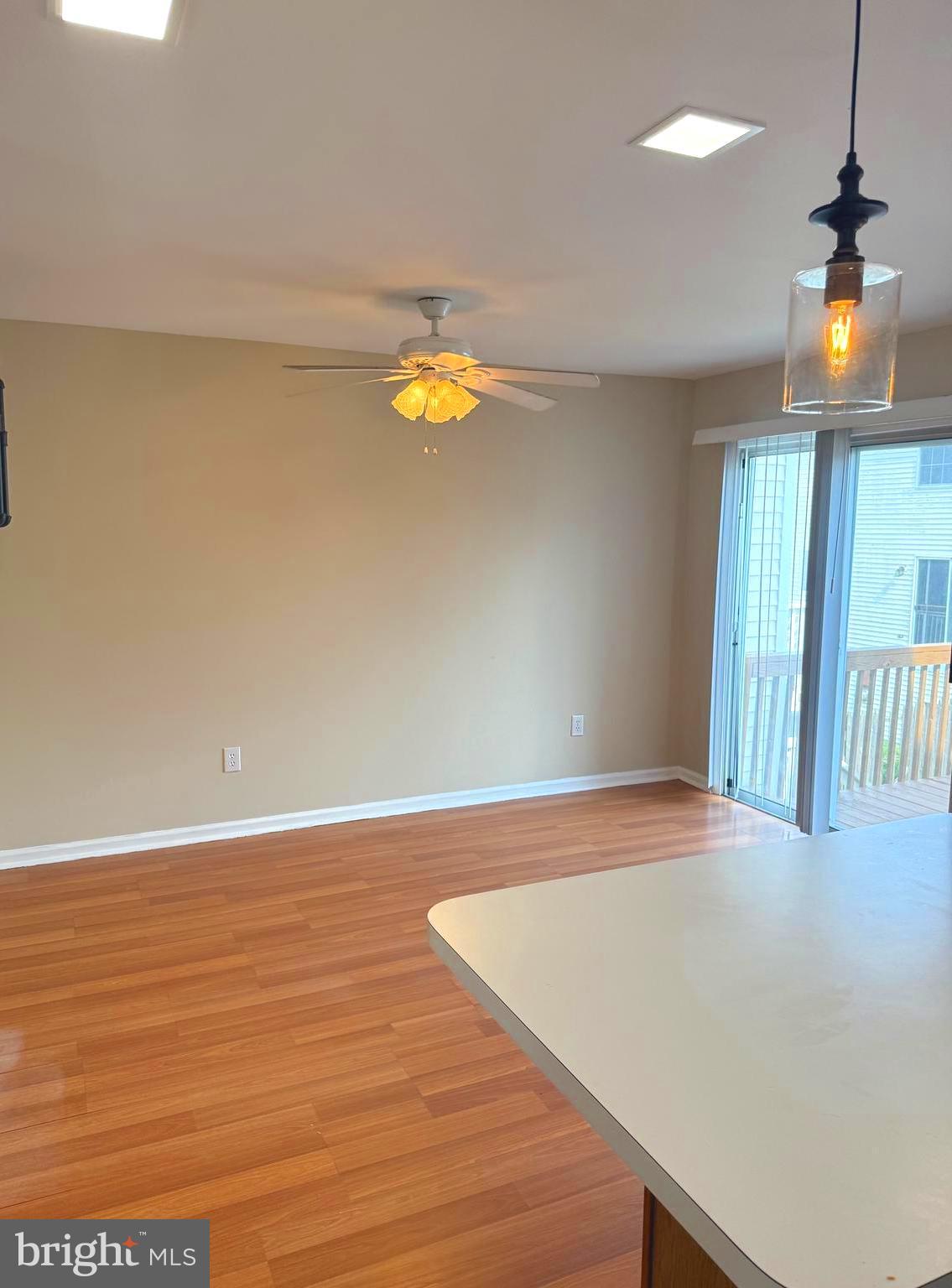 19 Spring Drive Newark, DE 19702 - Photo 15 of 47 a view of an empty room with wooden floor