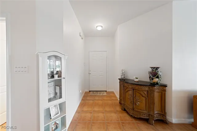 a view of a hallway with closet