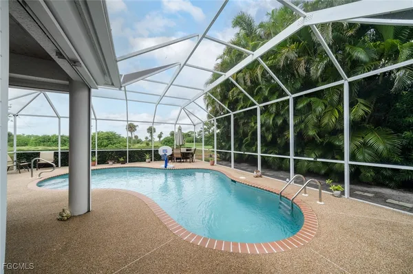 $287,500 | 620 Mirror Lakes Falls Lane, Lehigh Acres, FL 33974