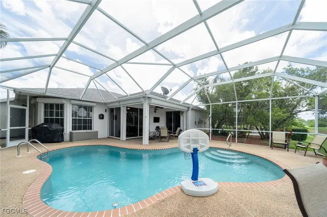 a view of a house with swimming pool