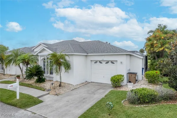 $287,500 | 620 Mirror Lakes Falls Lane, Lehigh Acres, FL 33974